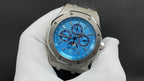 Audemars Piguet Royal Oak watch front view, vivid blue chronograph dial, steel bezel