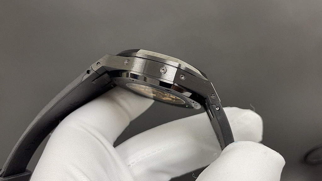 Audemars Piguet watch case side profile with metal bezel and crown
