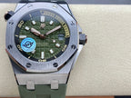 Audemars Piguet watch with green dial, date window, and green rubber strap, front view