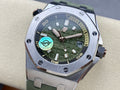 Audemars Piguet watch with green dial and green rubber strap, close-up face