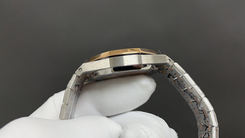 Audemars Piguet watch side profile with gold bezel edge and metal bracelet links