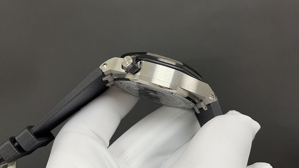 Audemars Piguet men's watch back view, stainless steel case, rubber strap