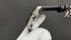Audemars Piguet men's watch side view, stainless steel case, black rubber strap