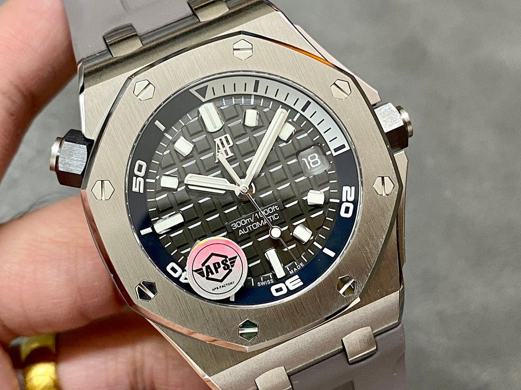Audemars Piguet Royal Oak watch close-up with dark dial, date 18, and AP emblem
