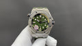 Audemars Piguet watch with green dial and green rubber strap, stainless steel case