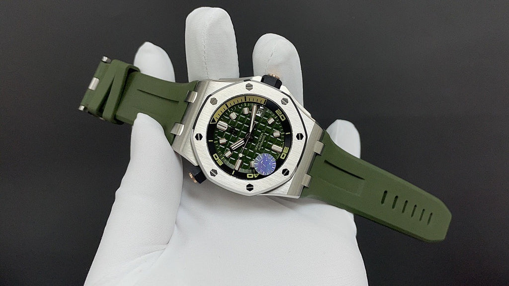 Audemars Piguet watch on hand, green rubber strap and green dial with steel case