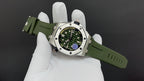 Audemars Piguet watch on hand, green rubber strap and green dial with steel case