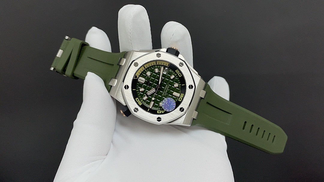 Audemars Piguet watch on hand, green rubber strap and green dial with steel case