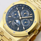 Gold-toned watch dial with day-date subdials, baton hour markers, and textured face