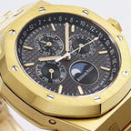 Audemars Piguet wristwatch dial close-up with black subdials and gold markers