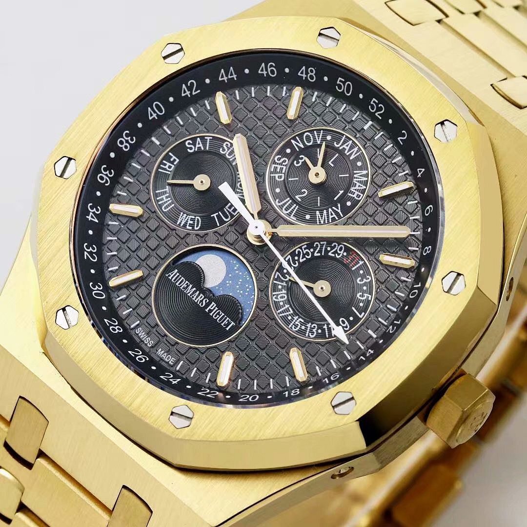 Audemars Piguet wristwatch face close-up with black dial and silver hands