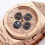 Audemars Piguet rose gold-tone watch face close-up with three subdials and date ring.