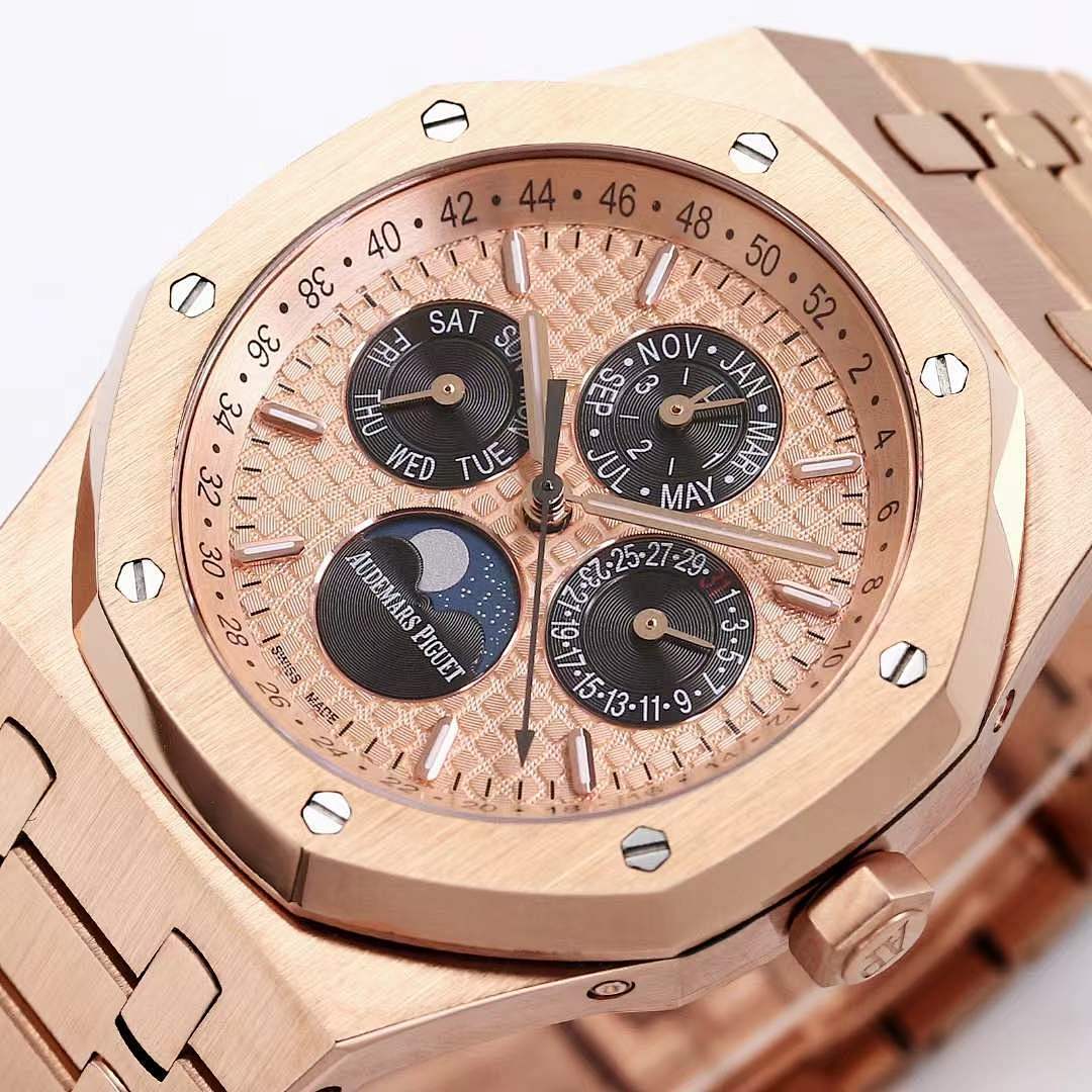 Audemars Piguet rose gold-tone watch face close-up with three subdials and date ring.