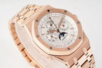 Rose gold wristwatch with white dial, multiple subdials, and crown