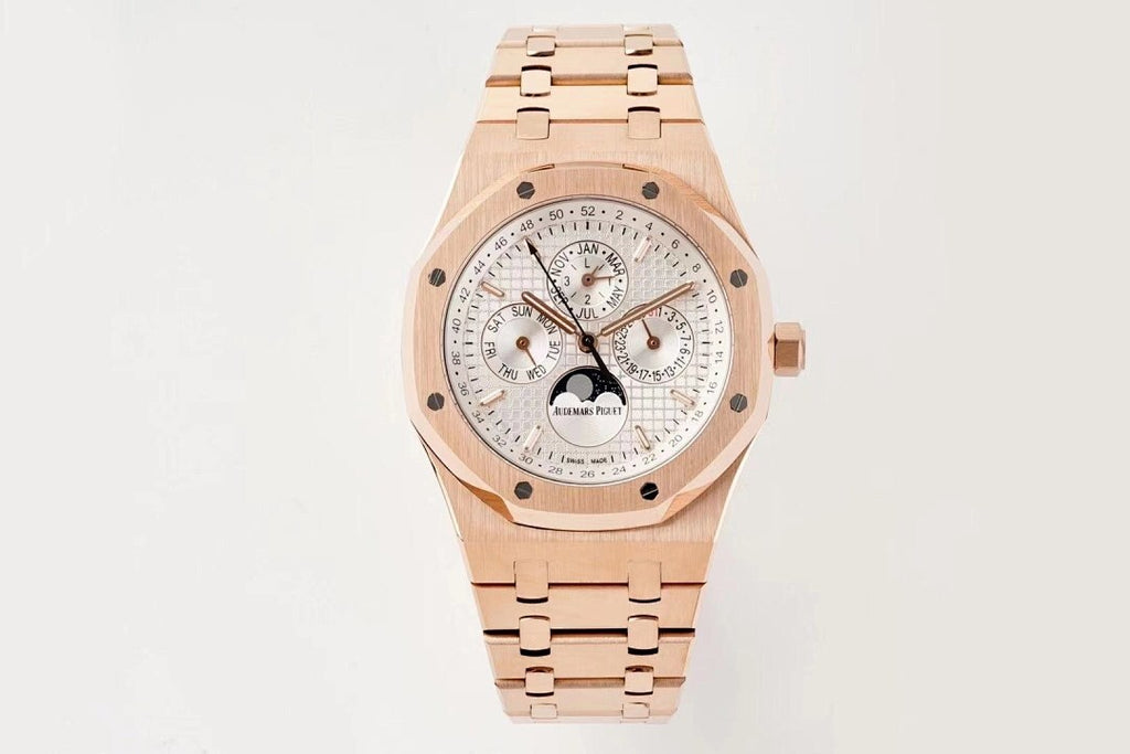 Rose gold Audemars Piguet wristwatch with white dial and three subdials