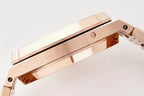 Rose gold-tone watch case side with brushed finish and crown/connector details.