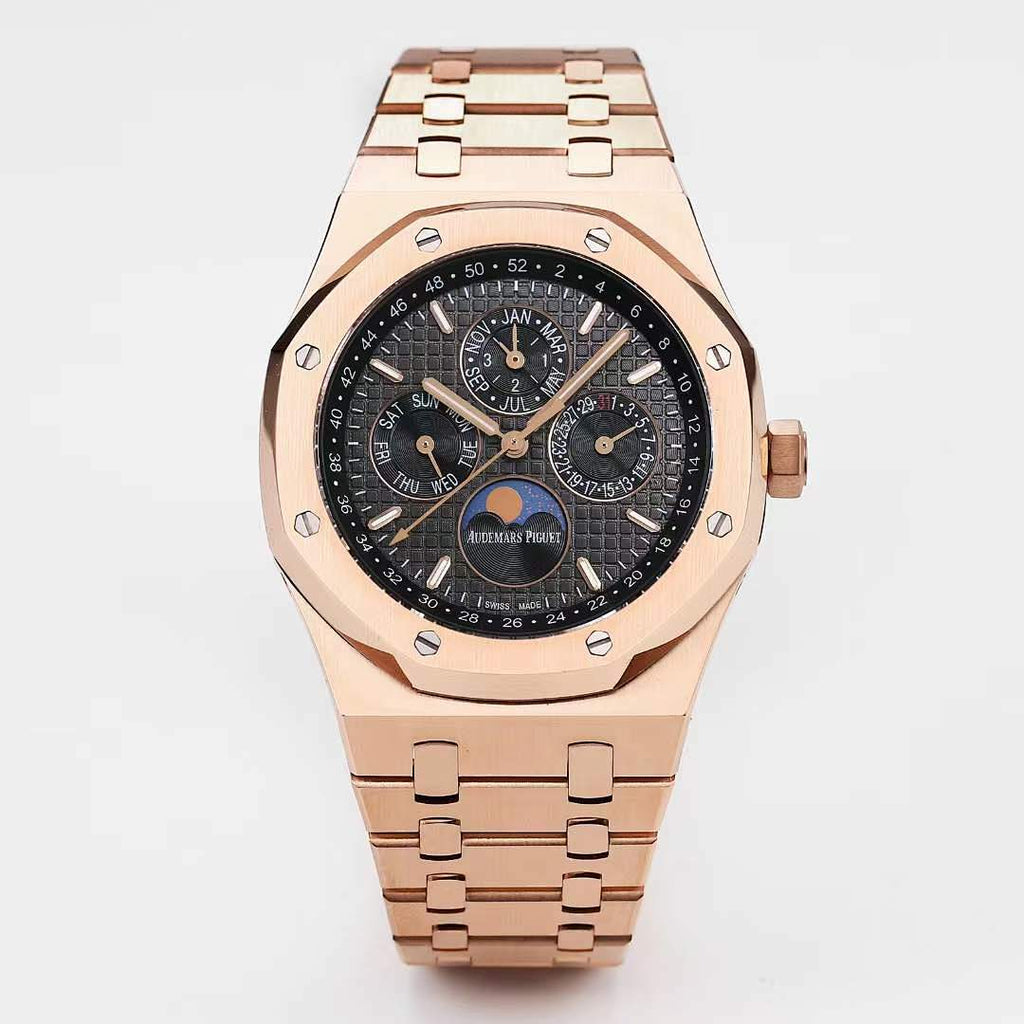 Audemars Piguet rose gold watch with black dial and linked metal bracelet