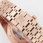 Audemars Piguet rose gold bracelet detail with engraved AP logo links