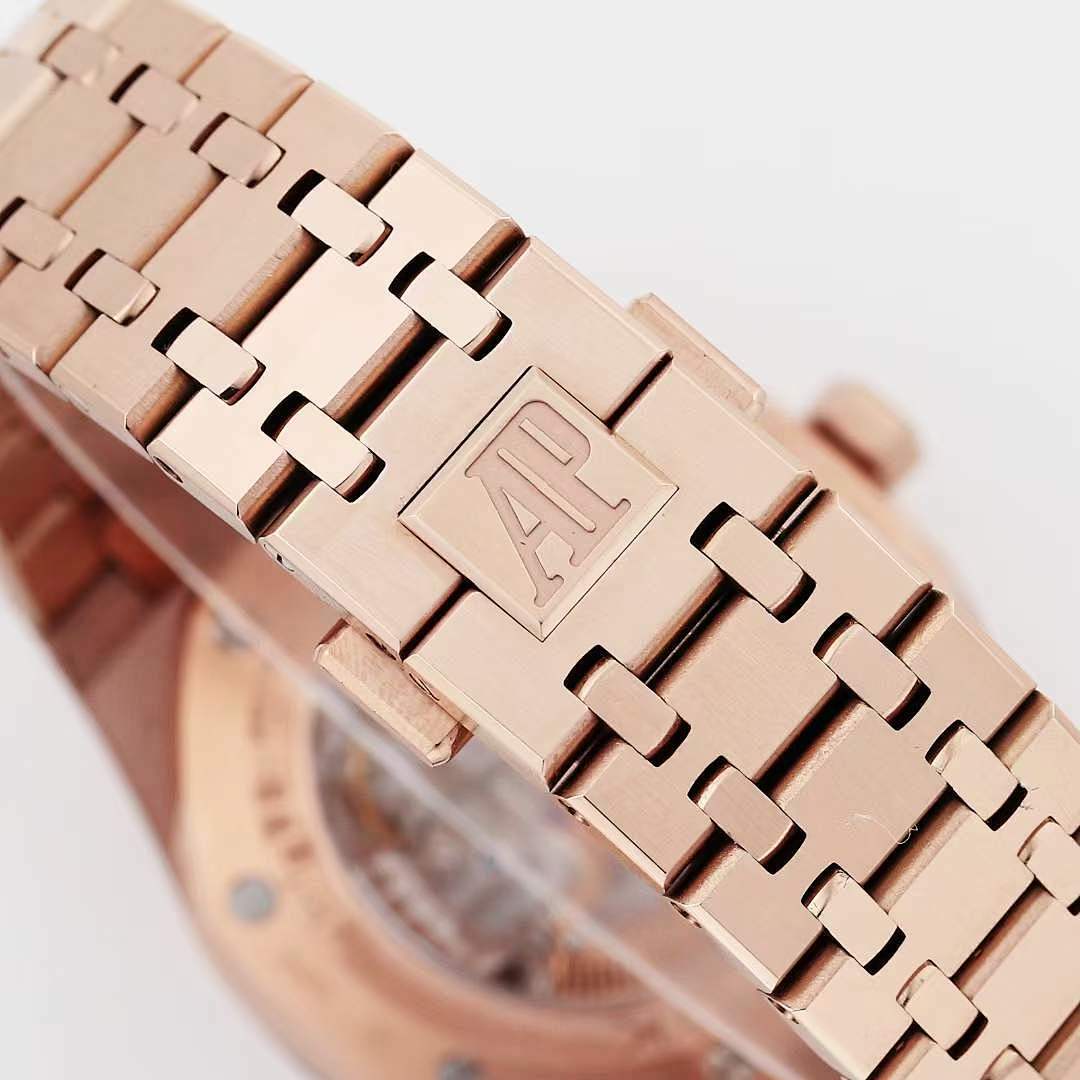 Audemars Piguet rose gold bracelet detail with engraved AP logo links