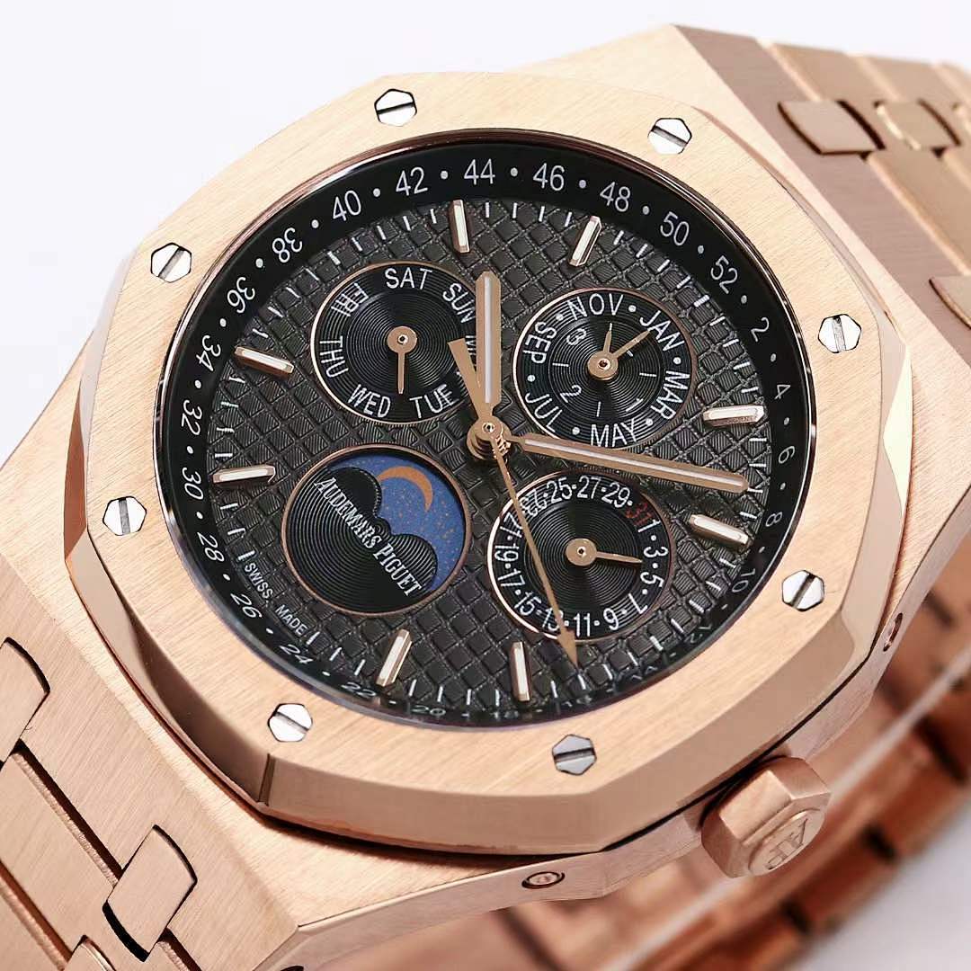 Audemars Piguet rose gold watch face with black dial and multi-dial layout