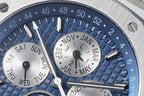 Audemars Piguet blue dial close-up with day/date display and hour markers