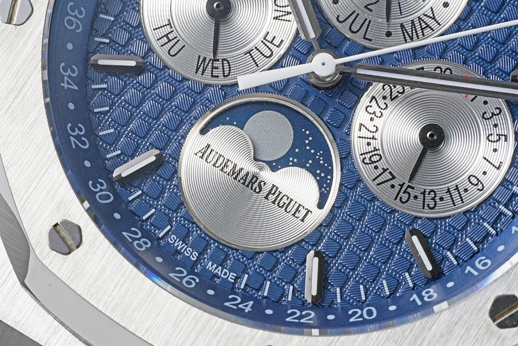 Audemars Piguet blue dial close-up with subdials and logo medallion