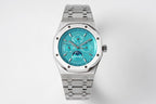Audemars Piguet steel watch front view with teal dial and bracelet links