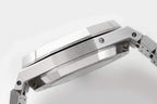 Steel watch case profile with brushed finish and crown-side details