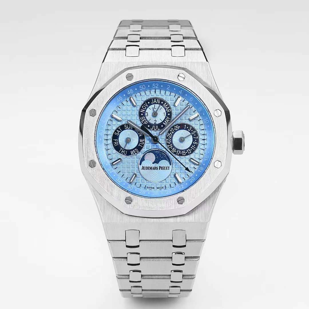 Stainless steel wristwatch with blue dial, multiple subdials, and link bracelet band