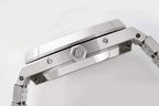 Brushed metal watch case top with AP emblem and screw details