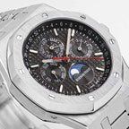 Royal Oak watch dial close-up with black dial, red seconds hand, and date-style subdial
