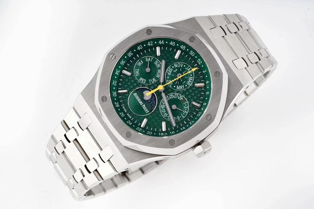 Octagonal stainless steel watch with green dial and bracelet, 3/4 view