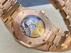 Audemars Piguet watch with see-through case back and rose-gold tone bracelet