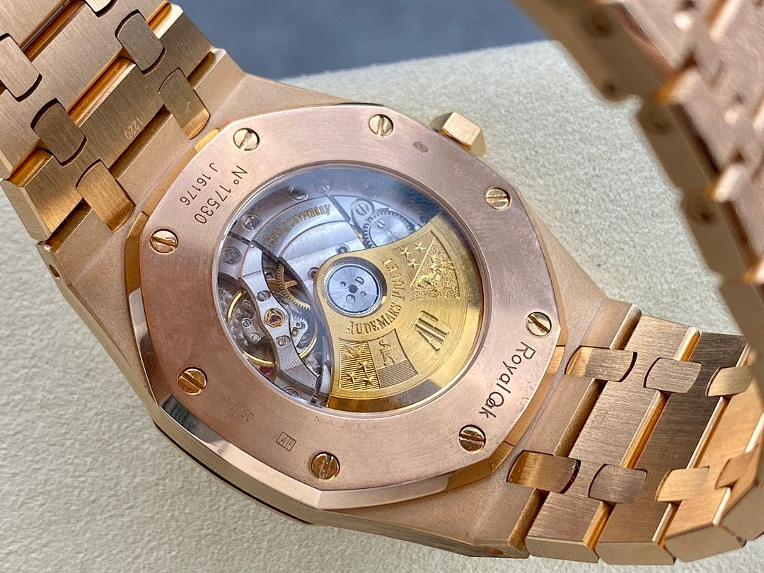 Audemars Piguet watch with see-through case back and rose-gold tone bracelet