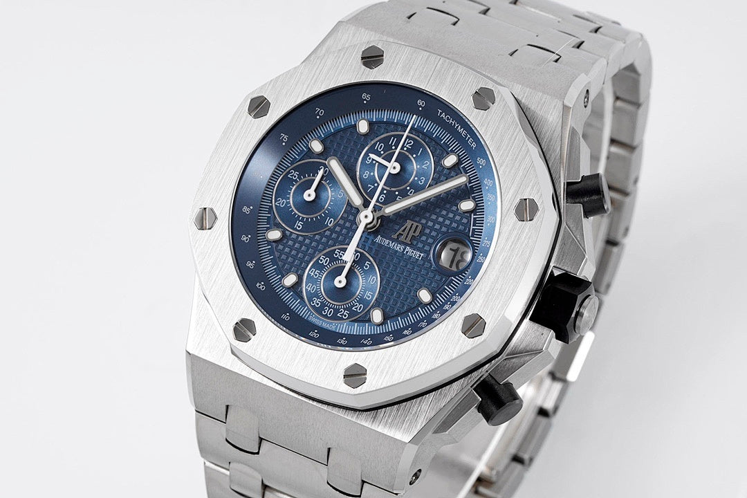 Audemars Piguet stainless steel watch with octagonal blue chronograph dial and bracelet.
