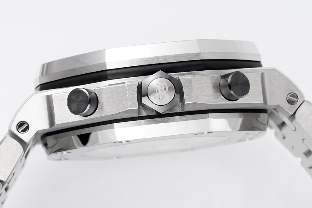 Brushed silver chronograph watch with crown and pushers on the case bezel