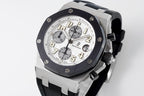 Audemars Piguet watch front angled with silver dial and black bezel on rubber strap