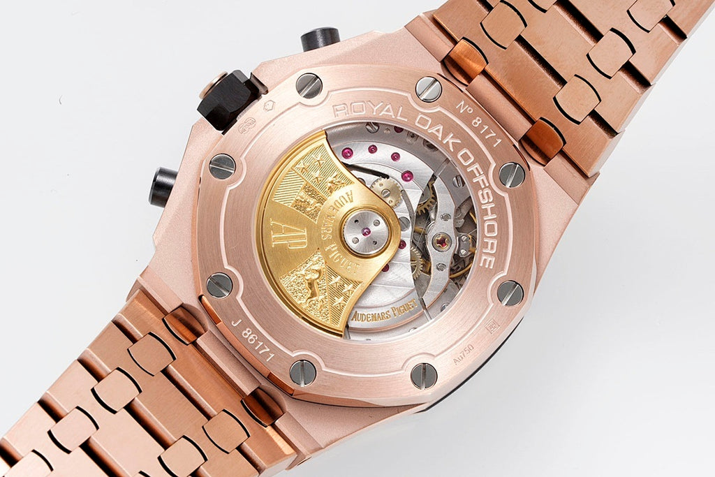 Audemars Piguet watch open caseback with gold-toned movement and rose-gold details