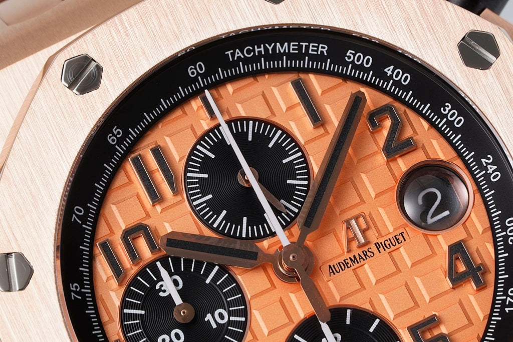 Audemars Piguet watch, tachymeter bezel with orange dial and three black subdials
