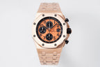 Audemars Piguet watch, full view with rose-gold tone bracelet and orange chronograph dial