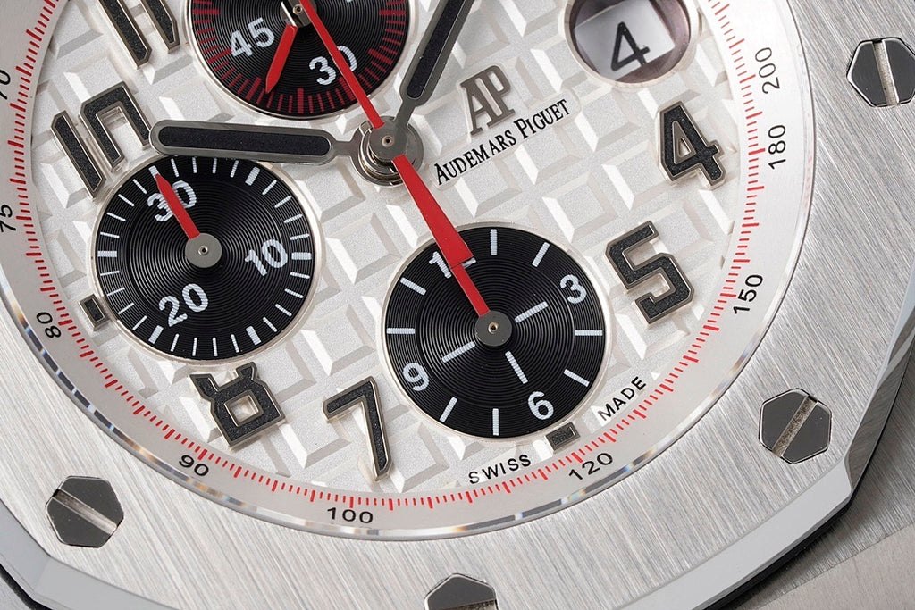 Royal Oak Offshore watch dial close-up, black subdials with red seconds accents