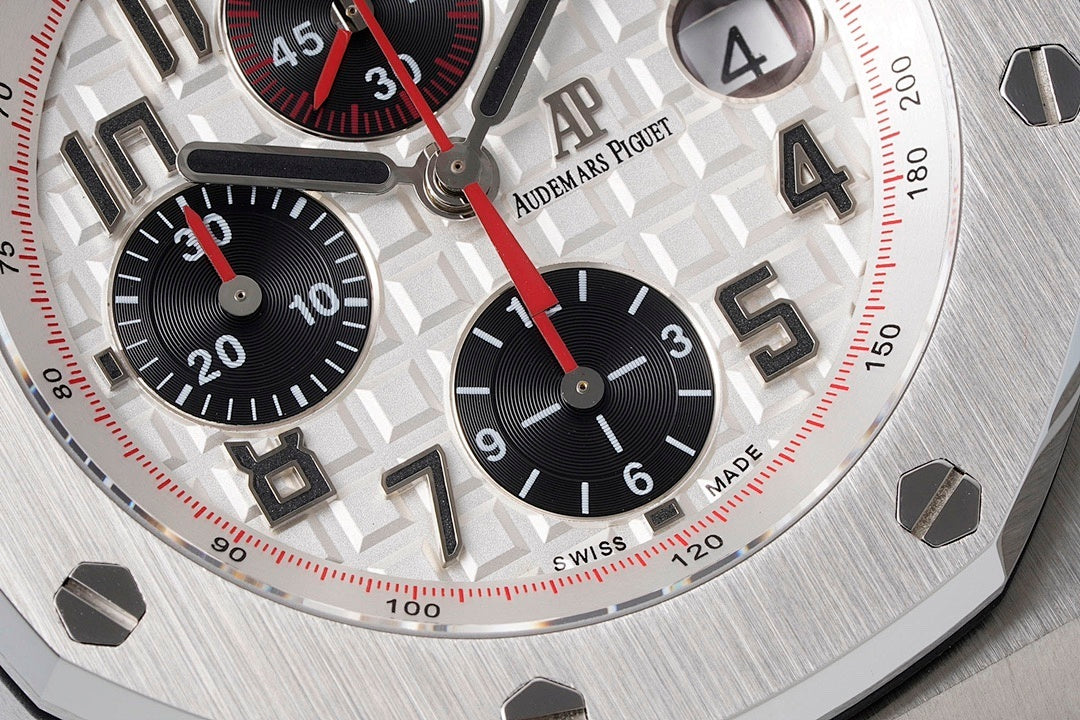Royal Oak Offshore watch dial close-up, black subdials with red seconds accents