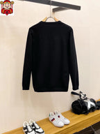 Black crewneck sweatshirt back view with long sleeves