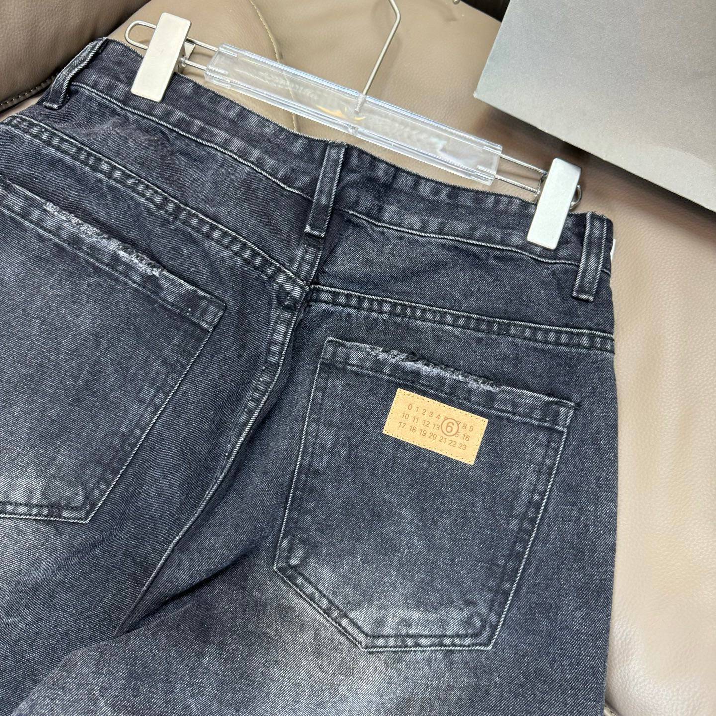 Maison Margiela denim jeans back pocket and waistband with label patch