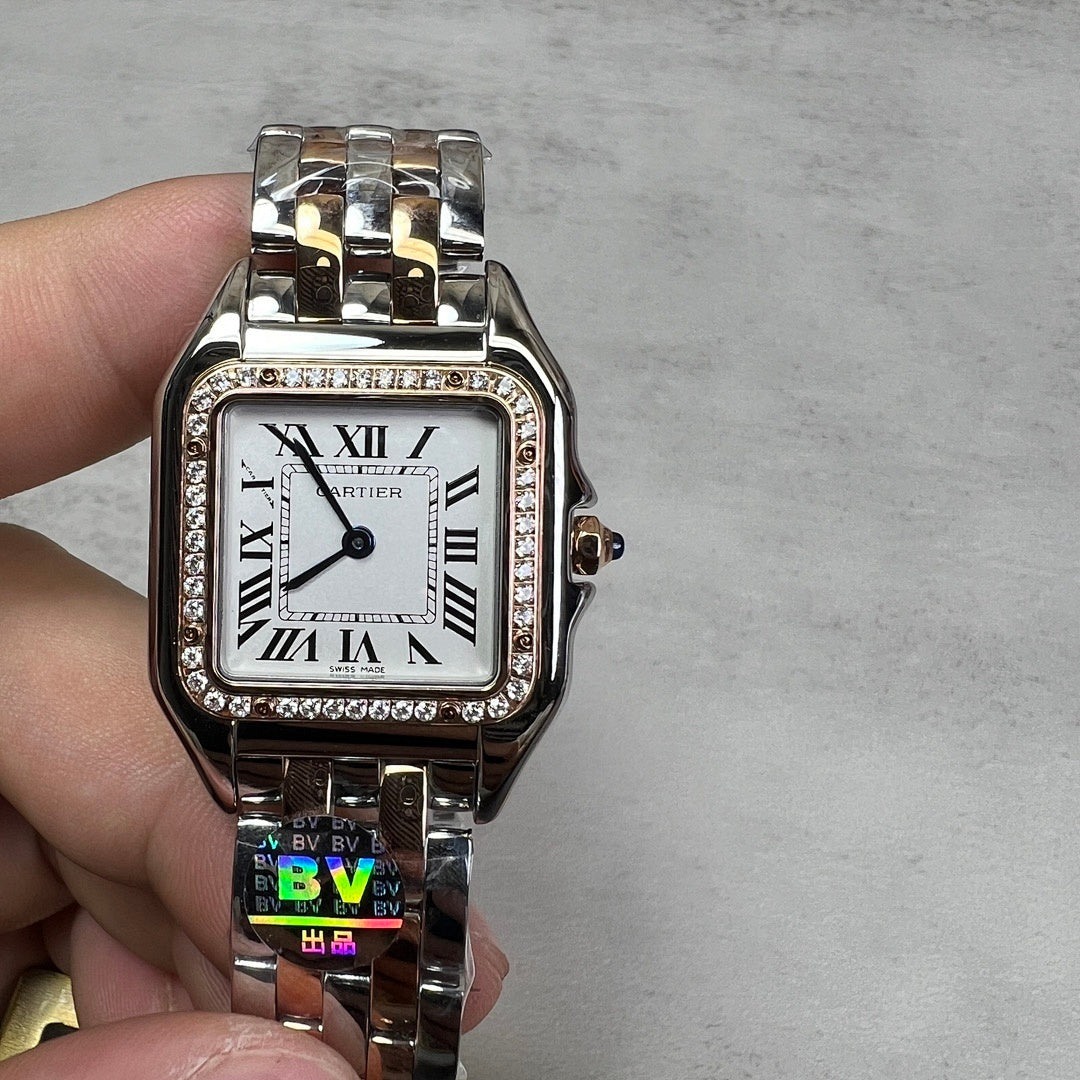 Cartier watch front view with rectangular white dial, Roman numerals, diamond-set bezel, bracelet