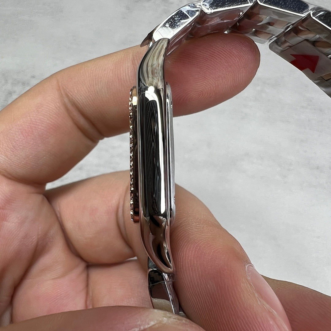 Cartier watch side profile in shiny silver metal with rounded case