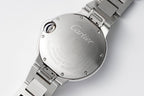 Cartier stainless steel watch case back with crown and engraved text