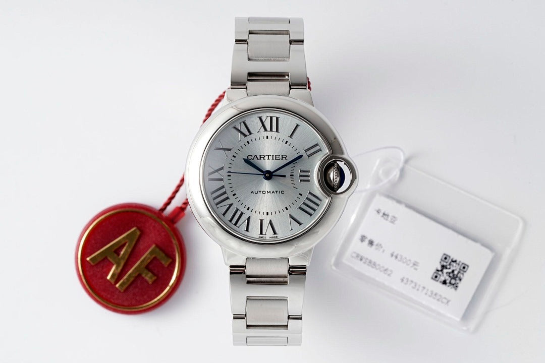Cartier stainless steel wristwatch with dark gray dial and red AF tag