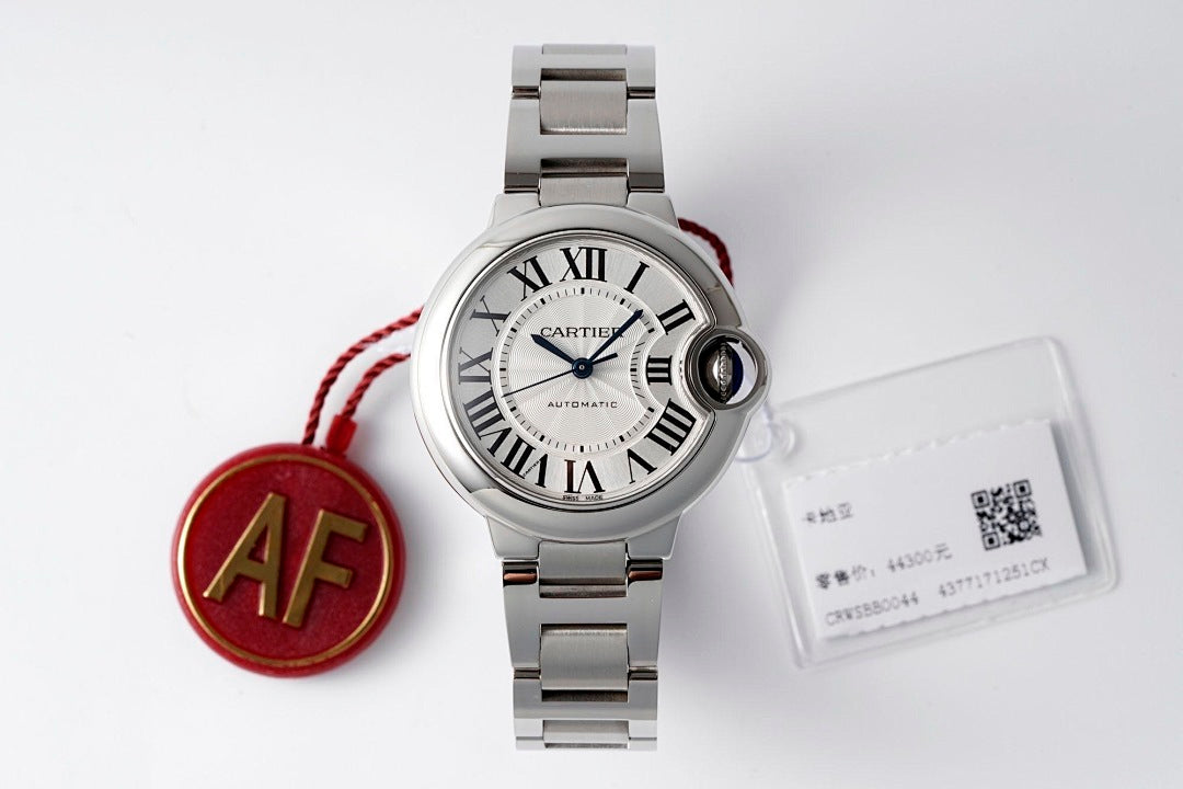Cartier stainless steel wristwatch with silver dial and red AF charm