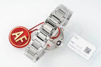 Steel Cartier watch with bracelet, red AF charm, and attached tag card